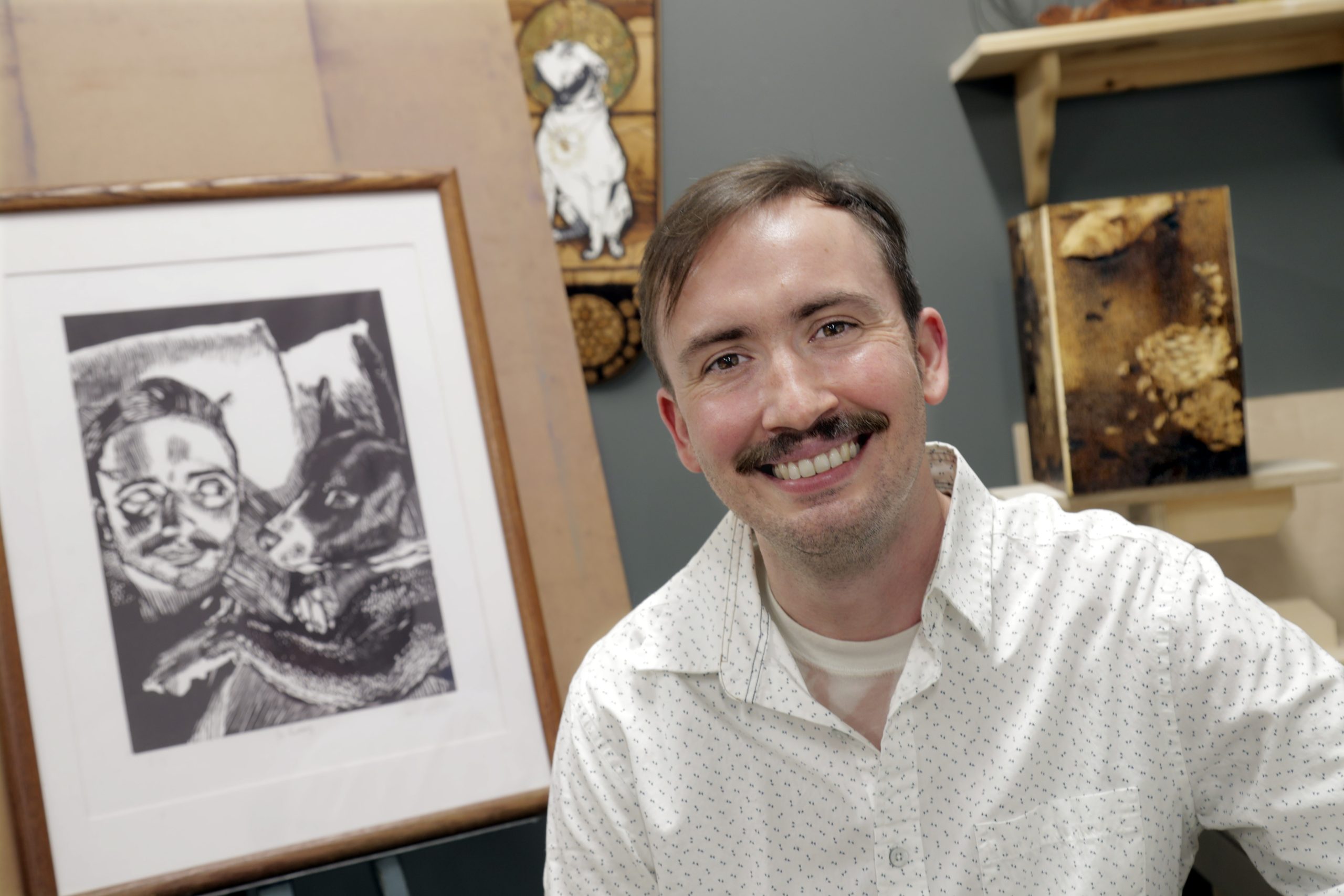 UA Little Rock studio art major Caleb LeFevre was awarded the Linda Blaine Flake Endowed Art Scholarship by philanthropist Leslye Shellam in celebration of World Art Day. Photo by Ben Krain.