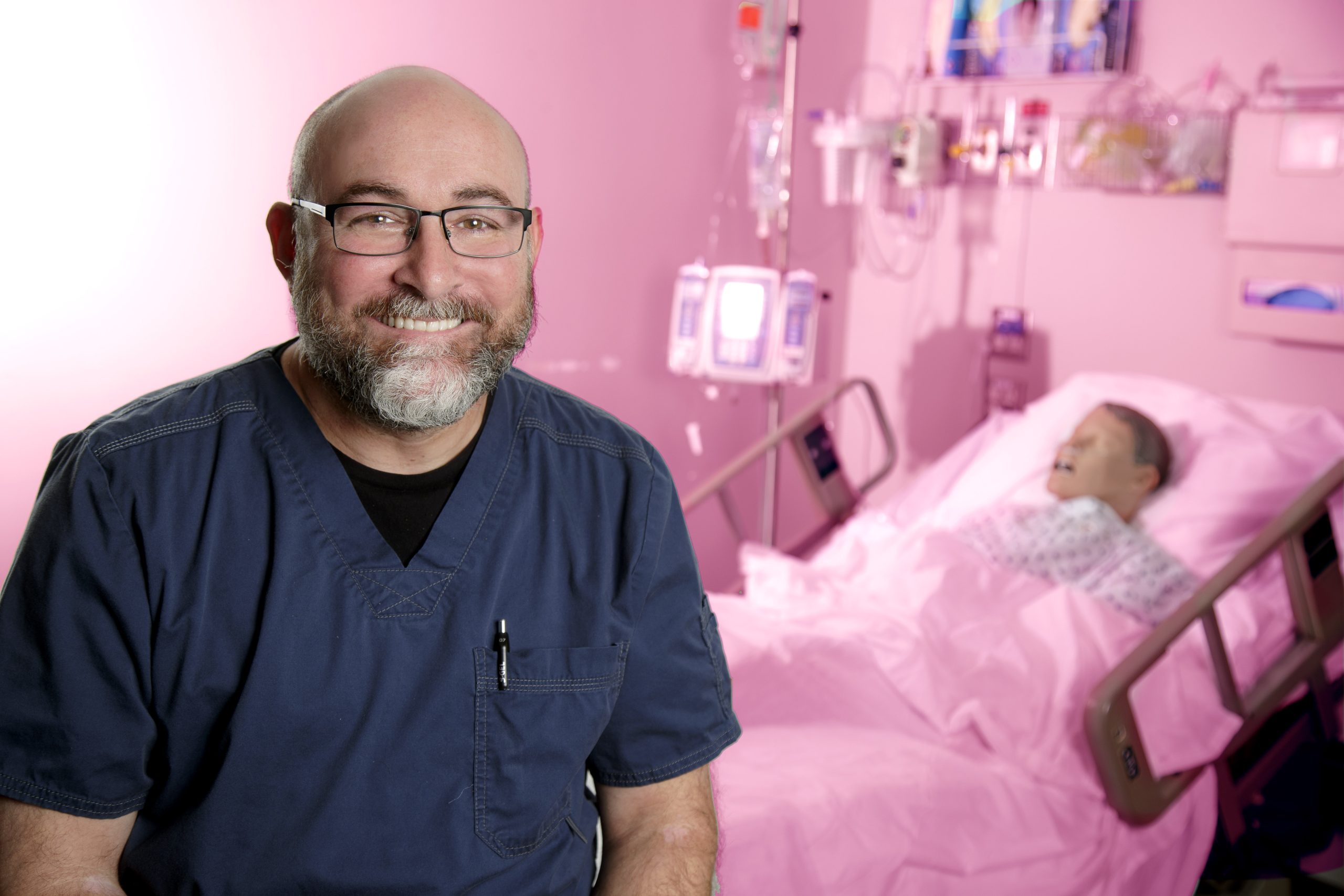 UA Little Rock nursing student Kevin Bates, seen here in the university's Center for Simulation Innovation, is working in an orthopedic operating room at Arkansas Surgical Hospital. Photo by Ben Krain