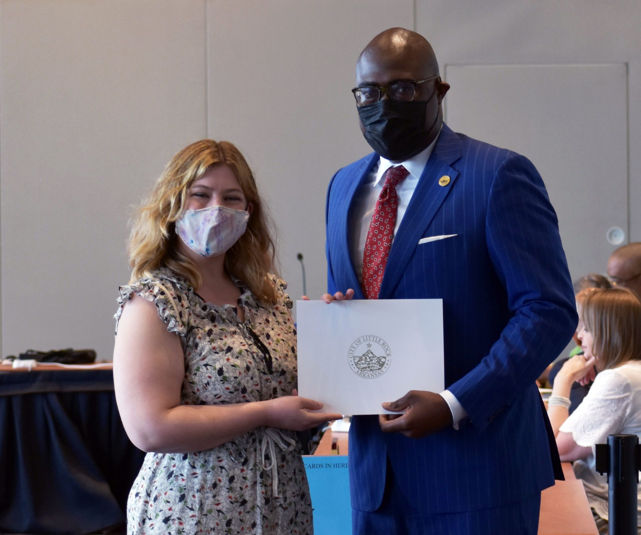 Little Rock Mayor Frank Scott Jr. presents Geneva Galloway with a certificate during her graduation from R.O.C.K. Academy.