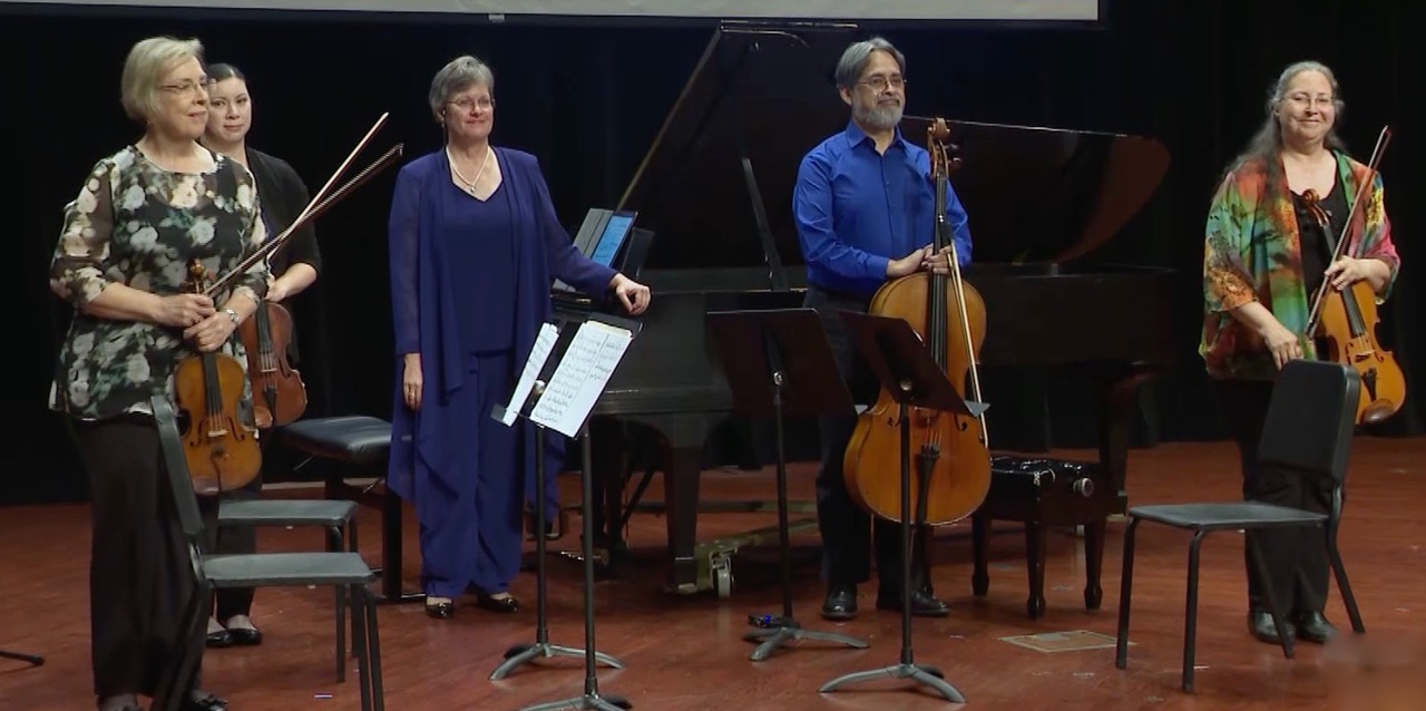 Dr. Linda Holzer, middle, is joined by Sandra McDonald, Leanne Day-Simpson, Rafael León, and Katherine Reynolds.