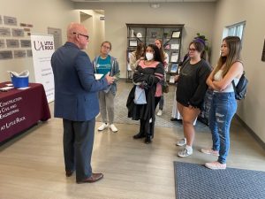 Dr. Hank Bray speaks with visitors at Vilonia Pathways Academy Conversion Charter.