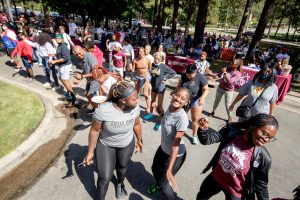 UA Little Rock students and staff enjoying the music at Baileys back-to-school picnic. Photo by BENJAMIN KRAIN 10/12//21