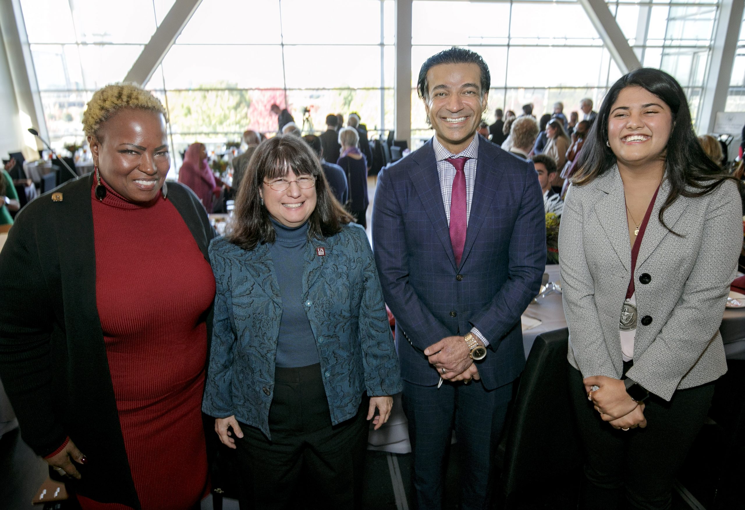 Chancellor Christina Drale poses with honorees of the 2021 UA Little Rock Distinguished Alumni Award winners after a ceremony at the Clinton Presidential Center. From left are Presidents Award winner, Helaine Williams, Chancellor Christina Drale, Distinguished Alumnus Award winner Jaafer Golzar and Edward Whibeck Memorial Award winner Stuti Chatterjee.