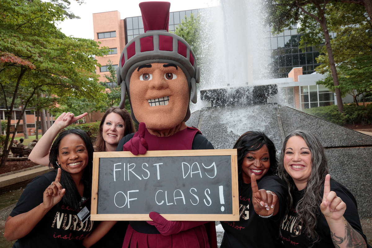 Students walk across campus on their way to class during the first of day the Fall semester.