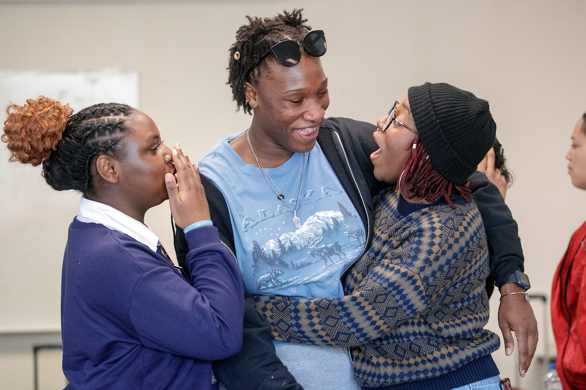 Members of the SADI, Student Affairs Diversity Initiatives, participate in a group event celebrating the 90s and 2000s style with dress, music and a TikTok challenge game.