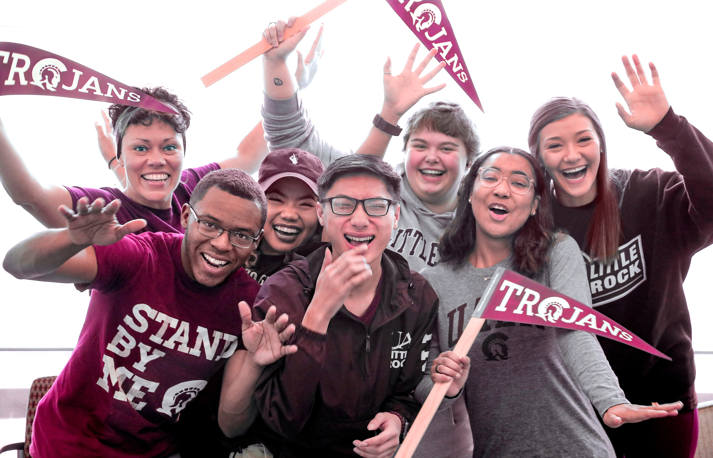 Group of students having fun on campus for admissions and recruitment.