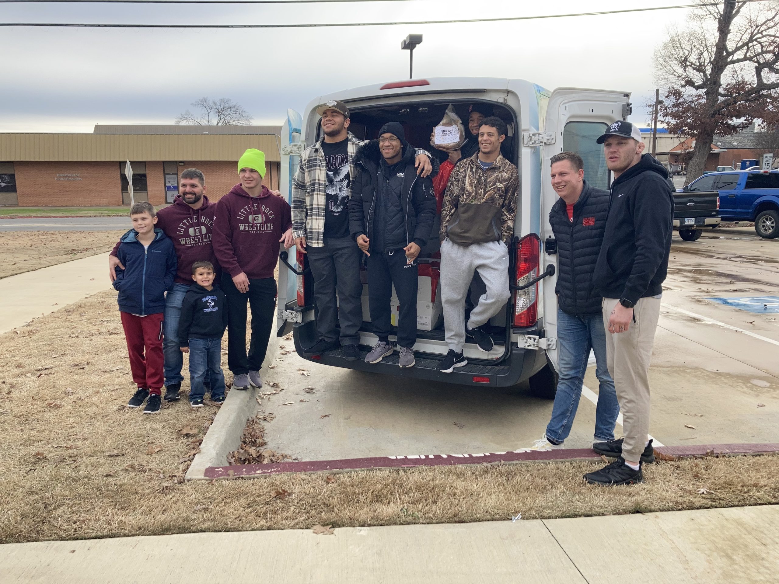 The Little Rock Wrestling Team donated 203 hams to nonprofit partner Every Arkansan on Dec. 16.