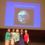 Some attendees of Ann Robinson's keynote speech pose for a photo to tweet from Symphony Hall in Denmark. 