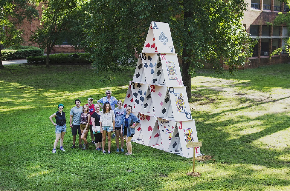 Students in Mia Hall's 2015 3-D Design summer workshop designed a 15-foot house of cards near the UALR Fine Arts Building