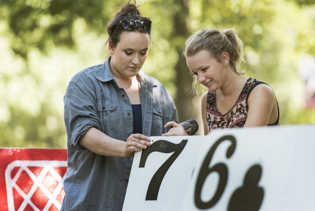 UALR students work on a 3-D sculpture, a house of cards on Friday, July 17, 2015.