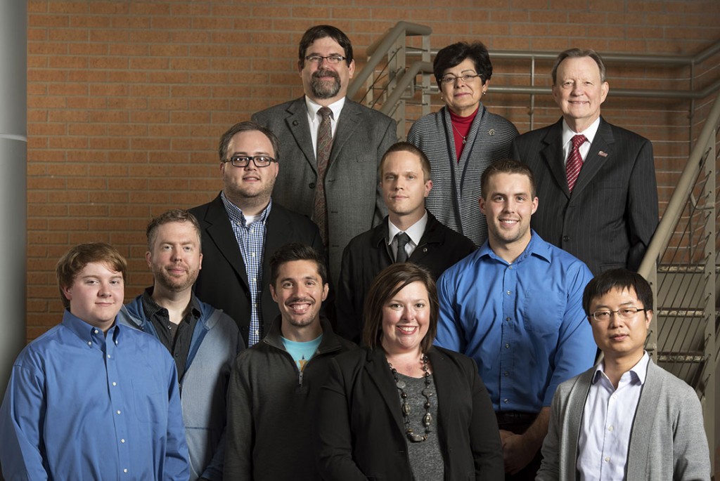 UALR students involved in the recent JOLT Hackathon are pictured with university leaders and others who led or participated in the event run by The Venture Center. (Not pictured: student Tommy Haycraft)