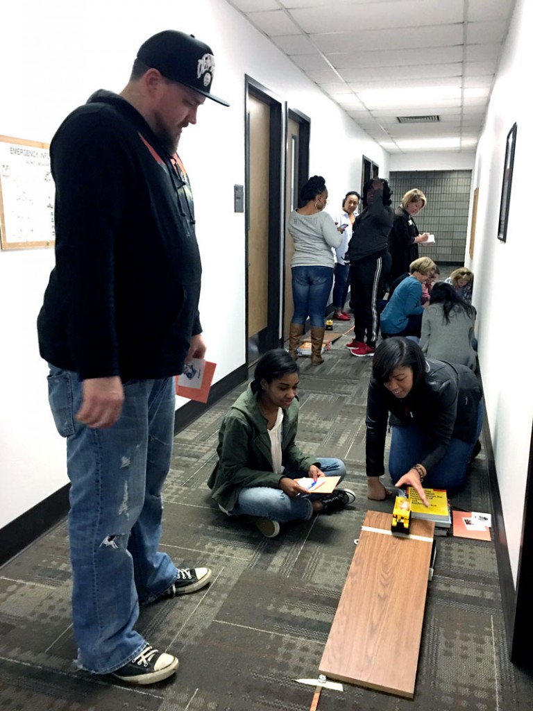 Arkansas elementary school teachers participate in a recent science instruction activity at the University of Arkansas at Little Rock