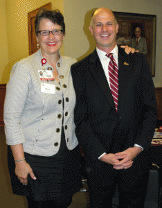 Heritage Society member Mary Cantrell and Christian O'Neal, vice chancellor for university advancement, attend "Coffee with the Chancellor". 
