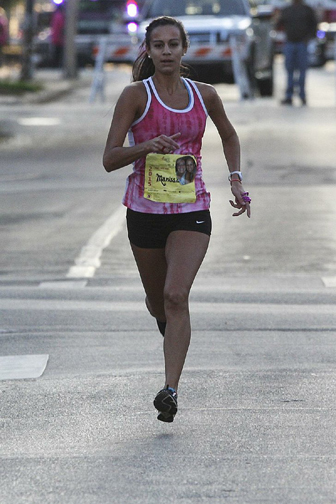 Marissa De La Paz paces herself as she heads to the finish line of the 2016 Race for the Cure.