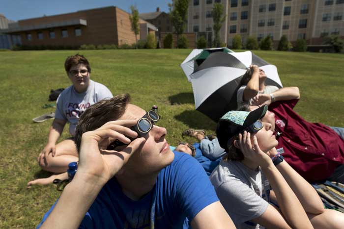 UA Little Rock students watch the solar eclipse. Photo by Lonnie Timmons III/UA Little Rock Communications.
