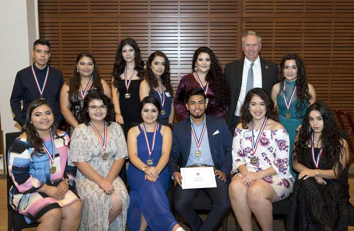 In the upper right photo, Chancellor Andrew Rogerson congratulates UA Little Rock students who received LULAC scholarships during the Oct. 13 gala at the Clinton Presidential Library and Museum. Photo by Lonnie Timmons III/UA Little Rock Communications.