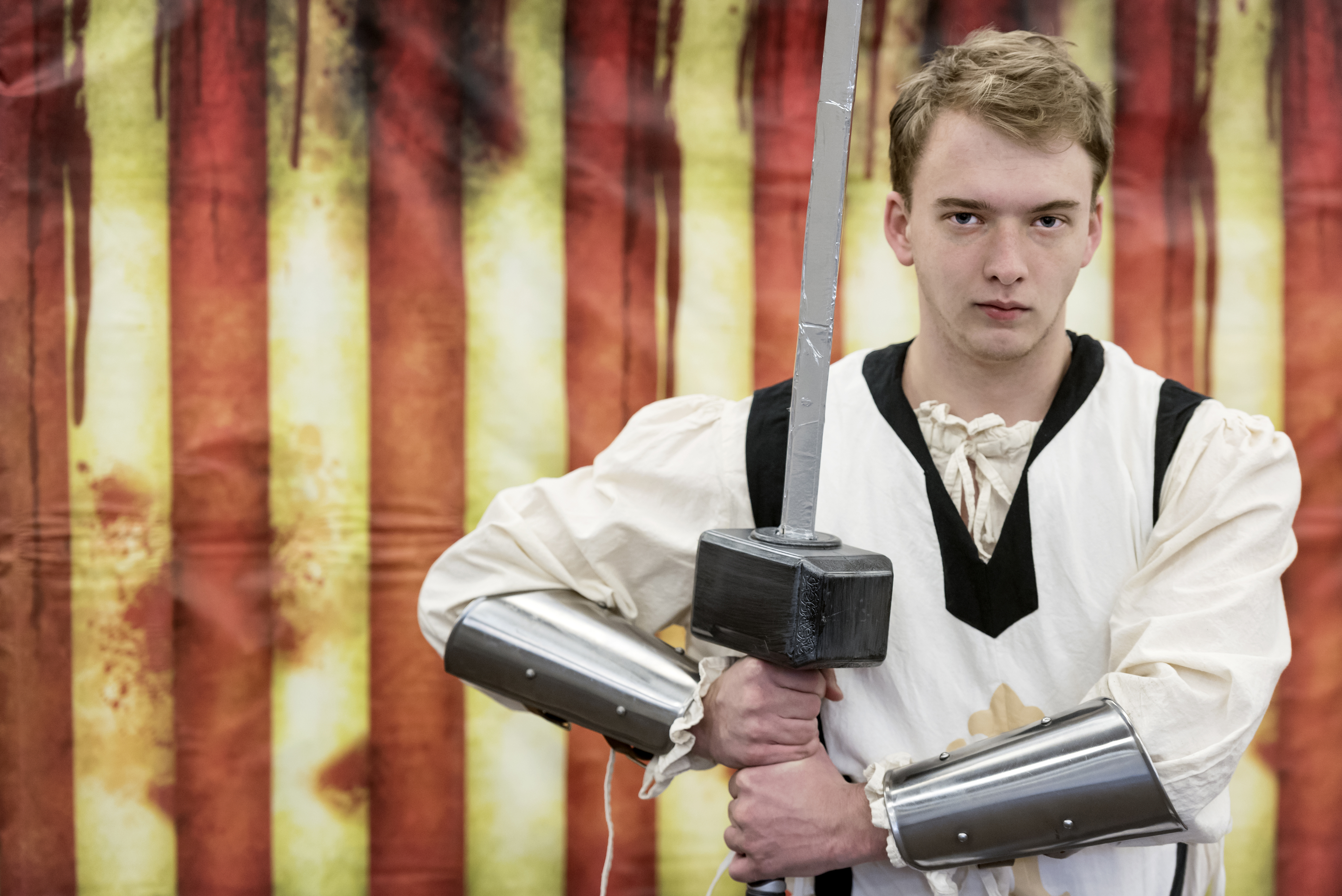 Junior Todd Howard poses in his knight during the costume contest at Ottenheimer Library on October 31, 2017.
