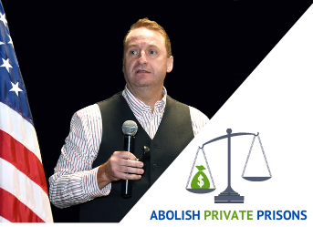 Photo of Prof. cummings and the Abolish Private Prisons logo