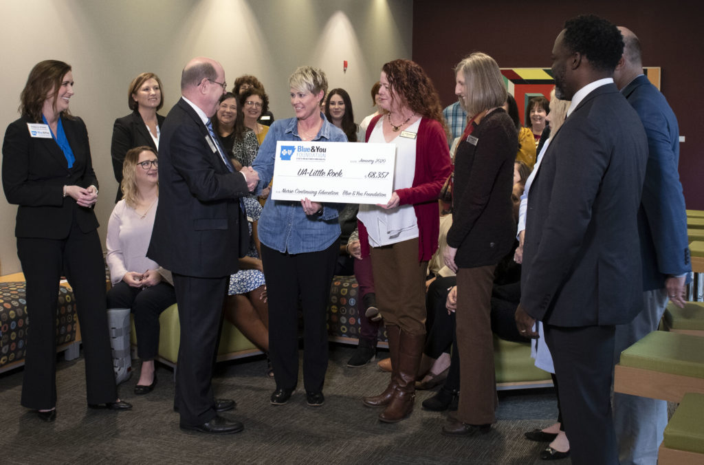 Members of the Blue & You Foundation and the University of Arkansas at Little Rock celebrate a grant to build a new continuing education center in the Department of Nursing. Photo by Brad Sims. 