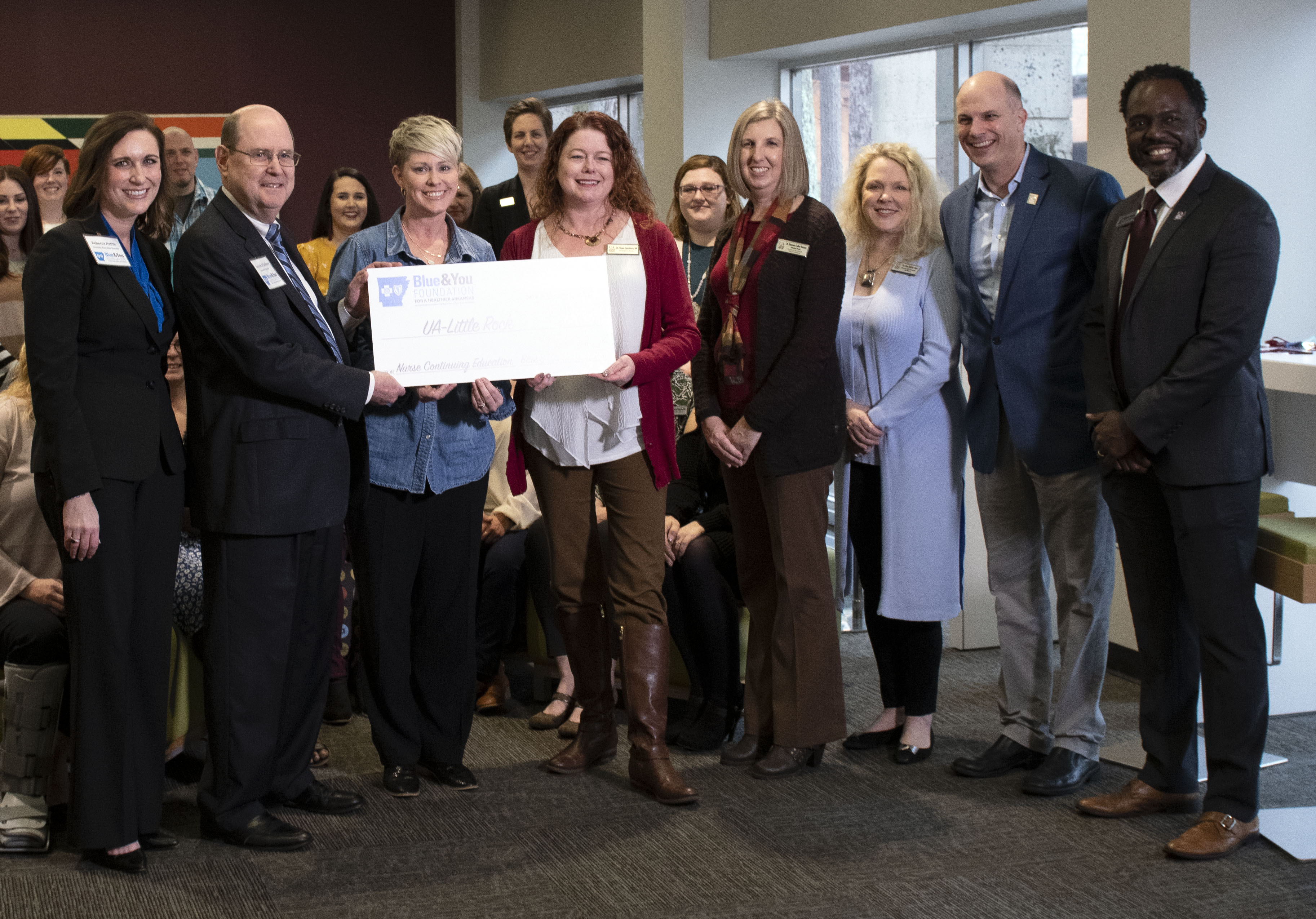 Members of the Blue & You Foundation and the University of Arkansas at Little Rock celebrate a grant to build a new continuing education center in the Department of Nursing. Photo by Brad Sims.