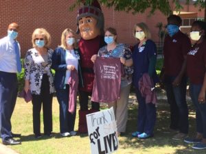 Maximus, the UA Little Rock mascot, and UA Little Rock volunteers deliver food, protective masks, and T-shirts to Saline Memorial Hospital in Benton to support of health care workers for National Nurse Appreciation Day. Photo by Angie Faller.