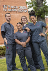 Nursing students hang out in front of the Pat Walker Center for Nursing Education at UA Little Rock. Photo by Ben Krain.