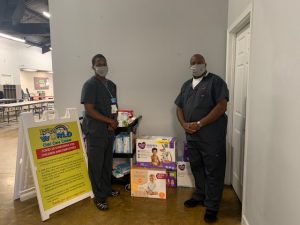 UA Little Rock nursing students Keith Lattimore and Jerrick Johnson collected and donated over 1,000 diapers and 1,150 wipes to donate to a local daycare in Conway as part of a class service project.