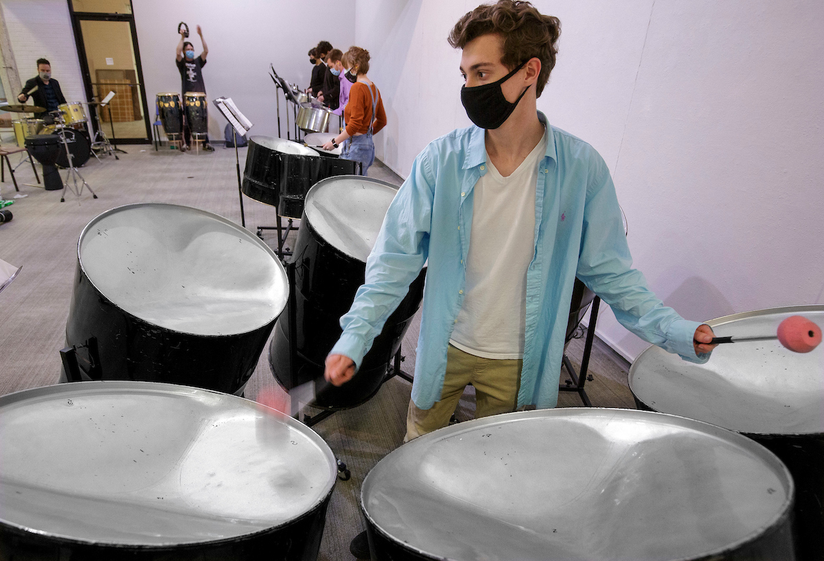 Six music students have formed a steel band ensmble. Several steel drum instruments were found in storage in the music department and refurbished by Assistant Professor of Percussion Justin Bunting, top left. Photo by Ben Krain.