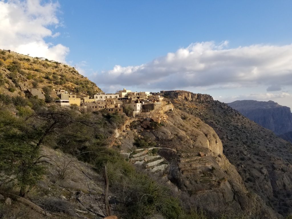The group visits Al Misfah village, on a hillside in Oman.