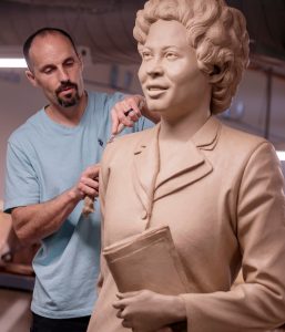 enjamin Victor works on the sculpture of Daisy Bates in the Windgate Center of Art + Design.