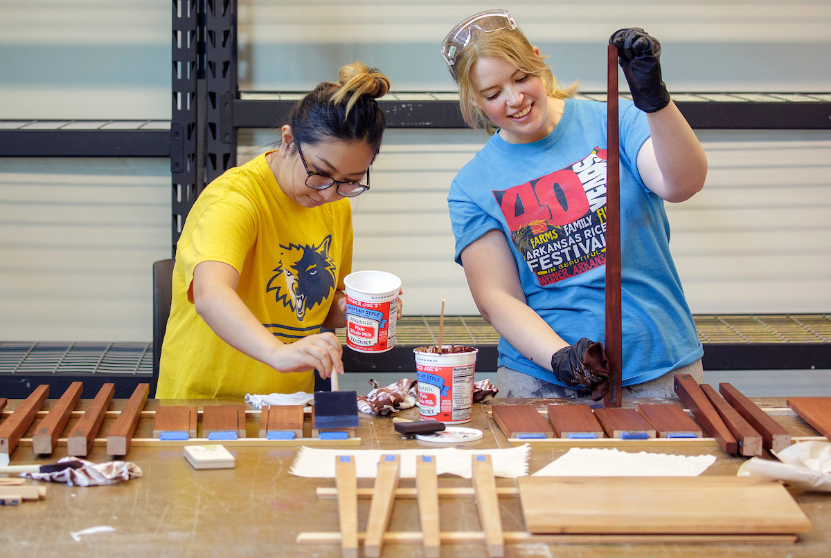 Teachers and educators craft a table during an Artways furniture and wood working program at the UA Little Rock Wingate Center for Art and Design.