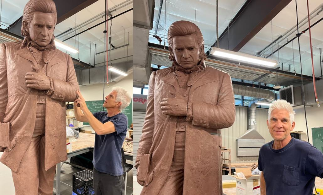 Artist Kevin Kresse works on his sculpture of Johnny Cash.