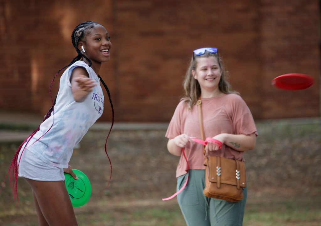 UA Little Rock students enjoy a game of disc golf on the university's new course. Photos by Ben Krain.