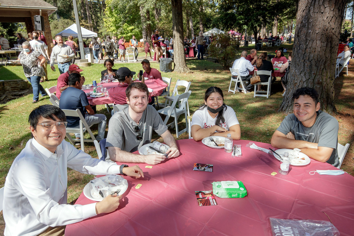 UA Little Rock students and staff participate in the annual BBQ at Bailey’s back-to-school picnic.
