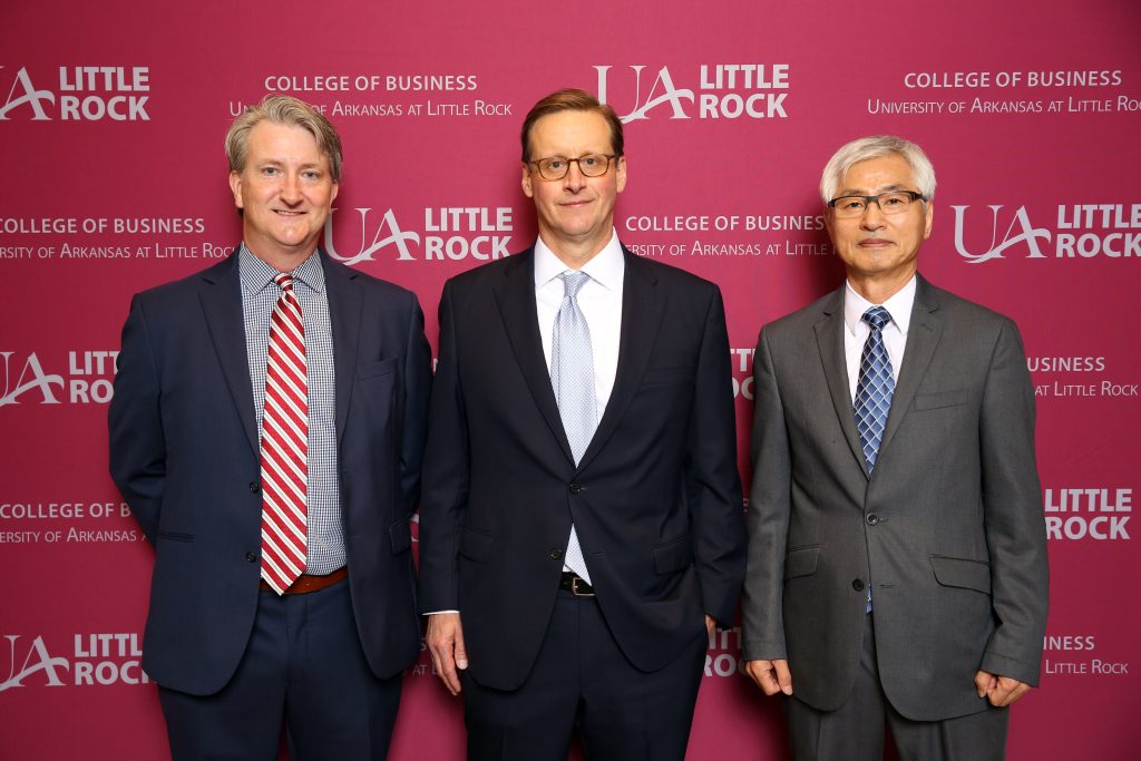 Professor Sung-kwan Kim, left, is pictured with Brad Eichler, the School of Business Distinguished Alumnus of the Year, and Chris Raper, winner of the Dean’s Award for Excellence.