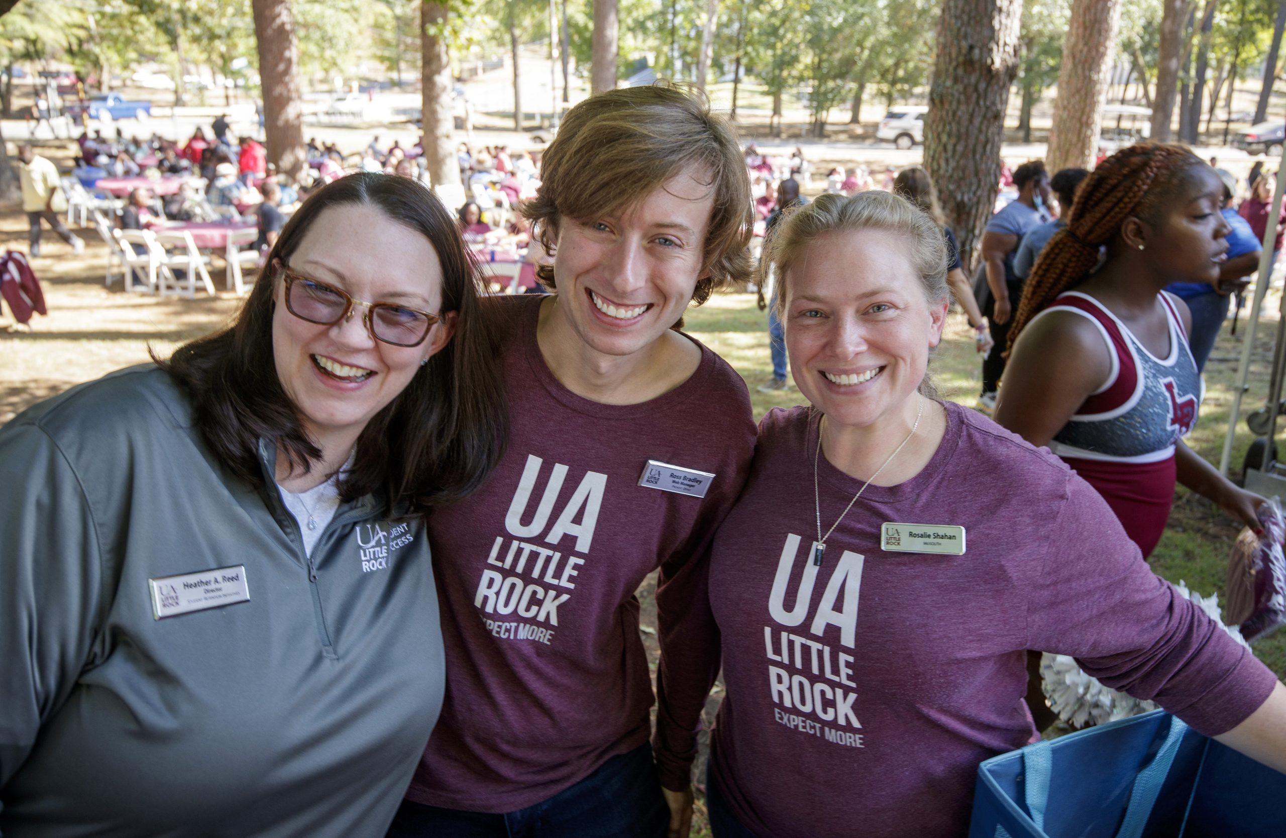 UA Little Rock staff members, from left, Heather Reed, Ross Bradley, and Rosale Shahan participate in the Alumni Association's annual BBQ at Bailey’s event. The university tradition celebrates the return of students to campus with free food and fun at the Bailey Alumni & Friends Center. This year also launched the university’s Centennial Campaign.