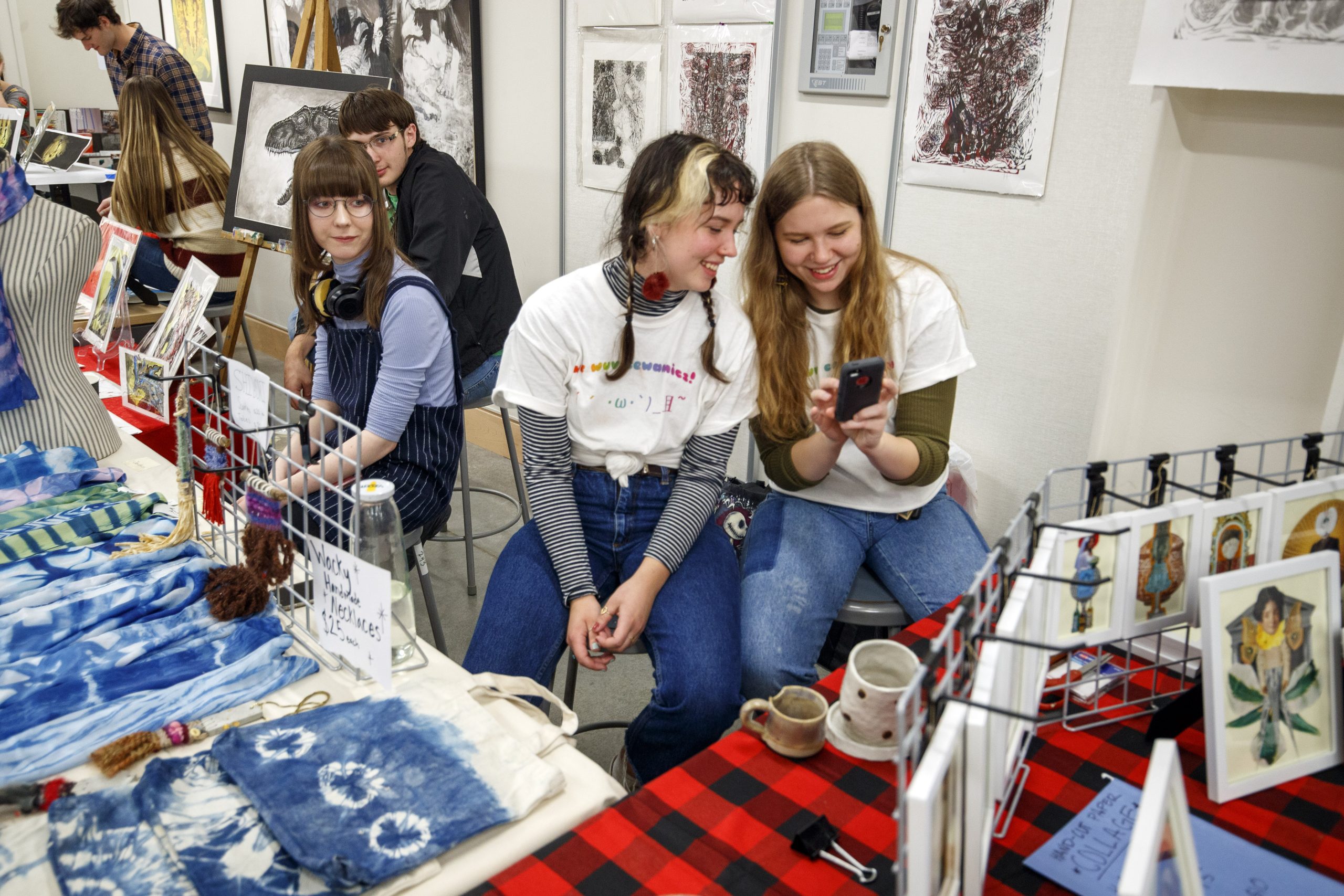 UA Little Rock students display their artwork during the Holiday Art Sale.