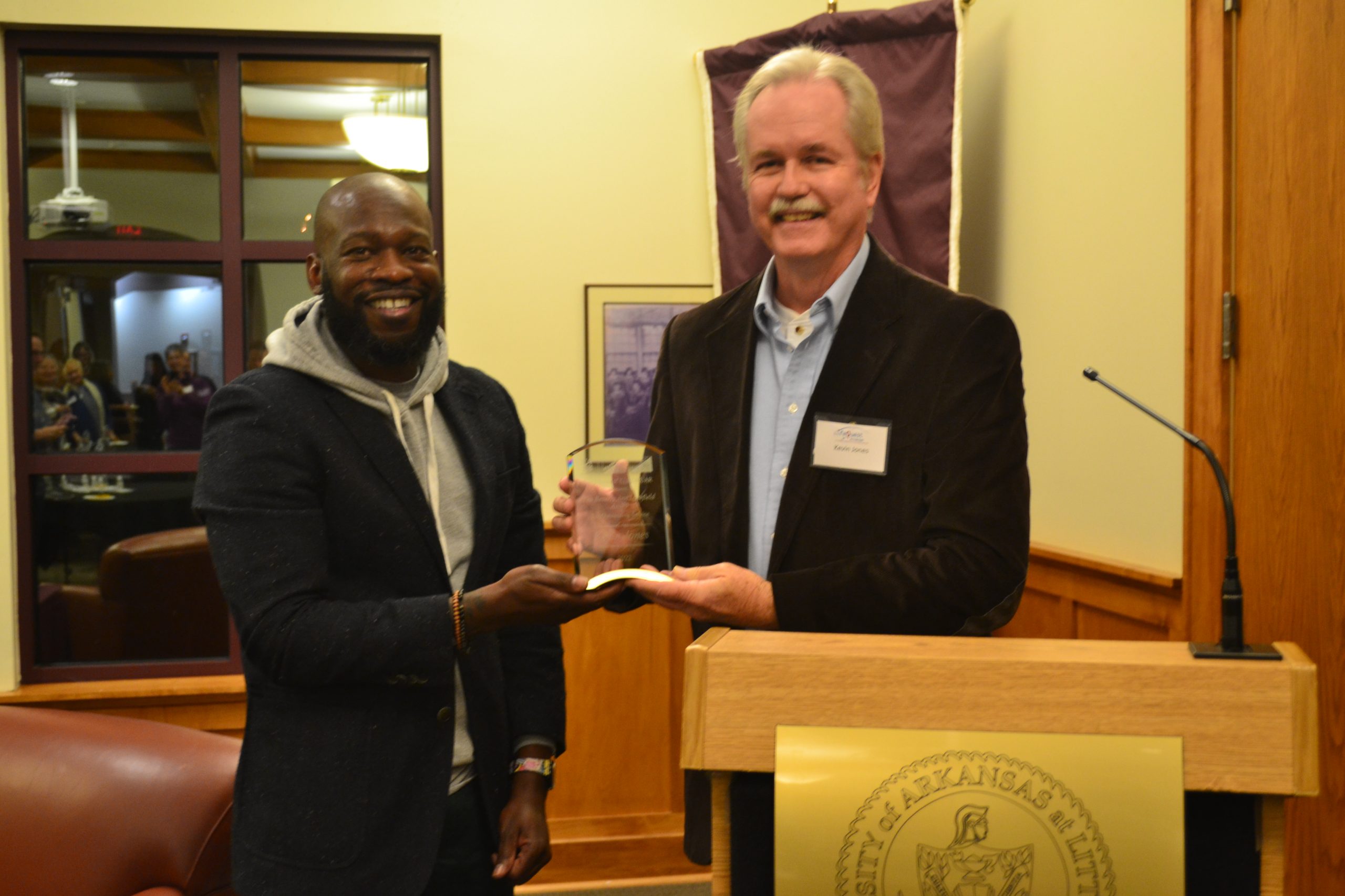 UA Little Rock Public Radio awards longtime volunteer Kevin Jones with an award.