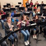 Music students participate in a wind ensemble class