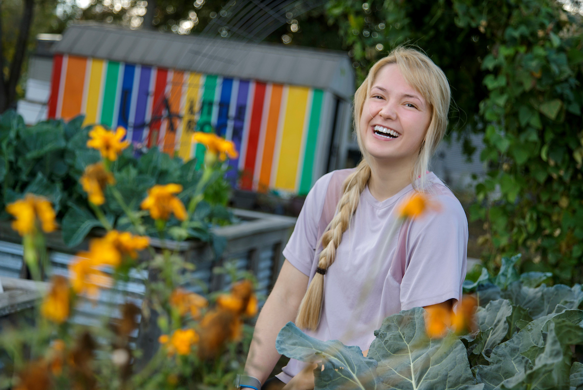 Taylor Arnold works in the Campus Garden through Trojan Works program, Trojan Works offers on-campus jobs with flexible schedules to help students financially with study-work-life balance.