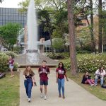 UA Little Rock students walk around campus.