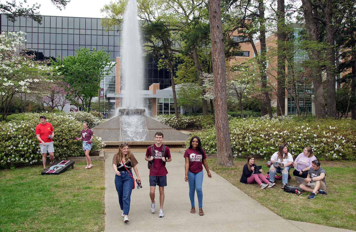 UA Little Rock students walk around campus.