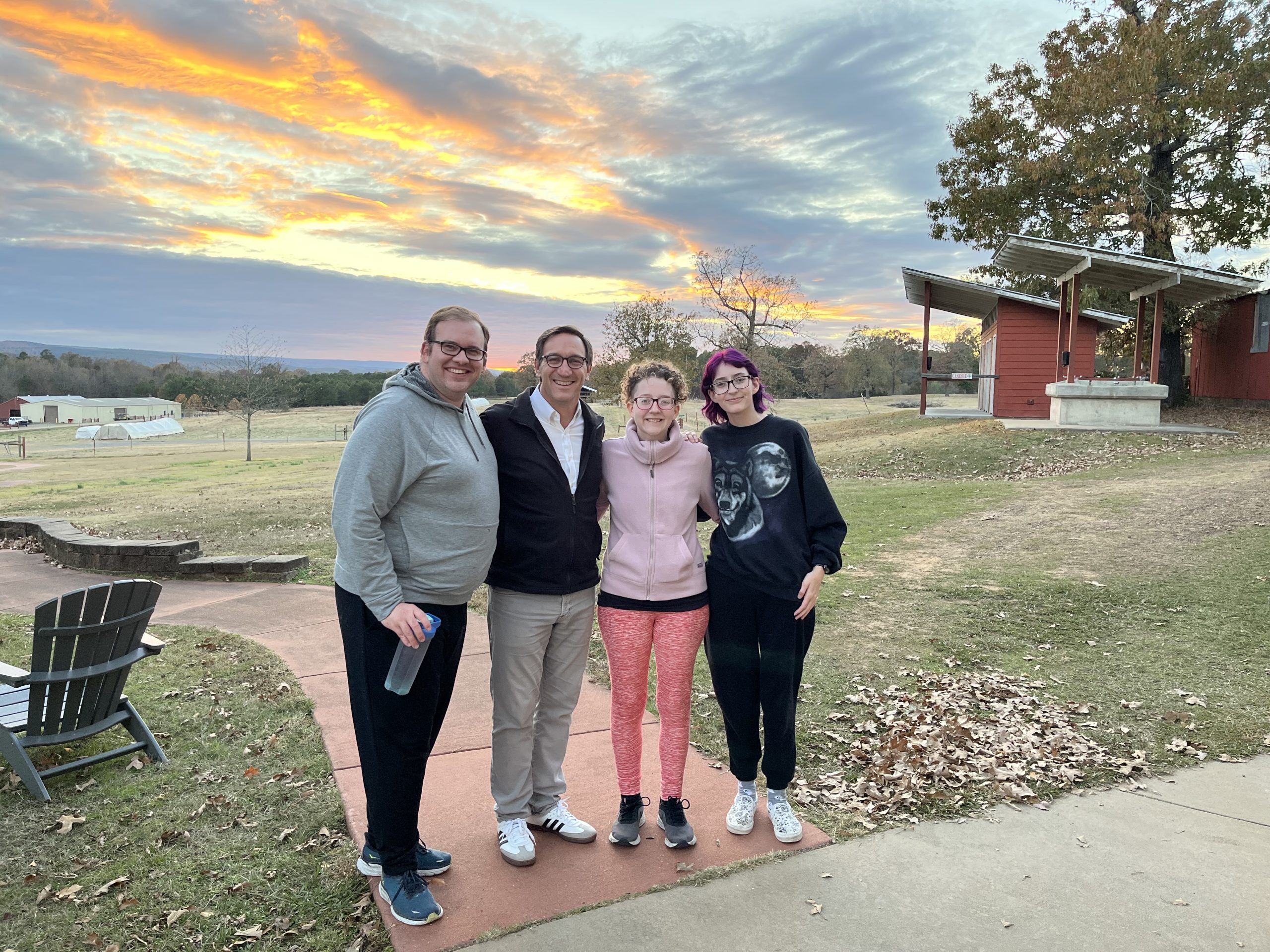 Professor Julien Mirivel attends the Heifer 12 Cornerstones training with alumnus Marc Gray and students Olivia Petrides and and Lizzy Petrides.