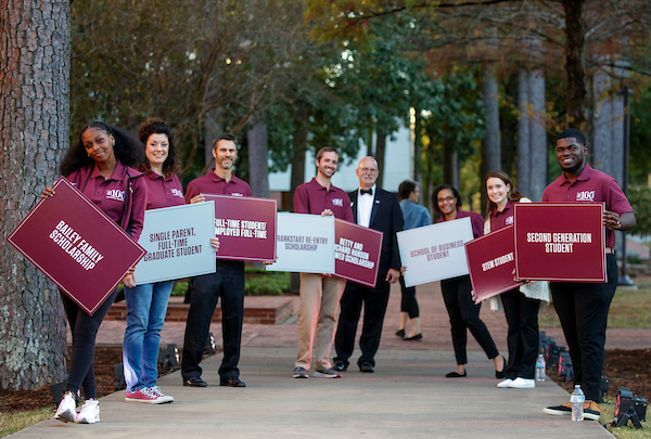 Students greet guests of the UA Little Rock Centennial Celebration Kickoff fundraising event. The university has raised almost $163 million of its $250 million Centennial Campaign fundraising goal for scholarships, student success, program excellence, and learning environments. Photo by Ben Krain.