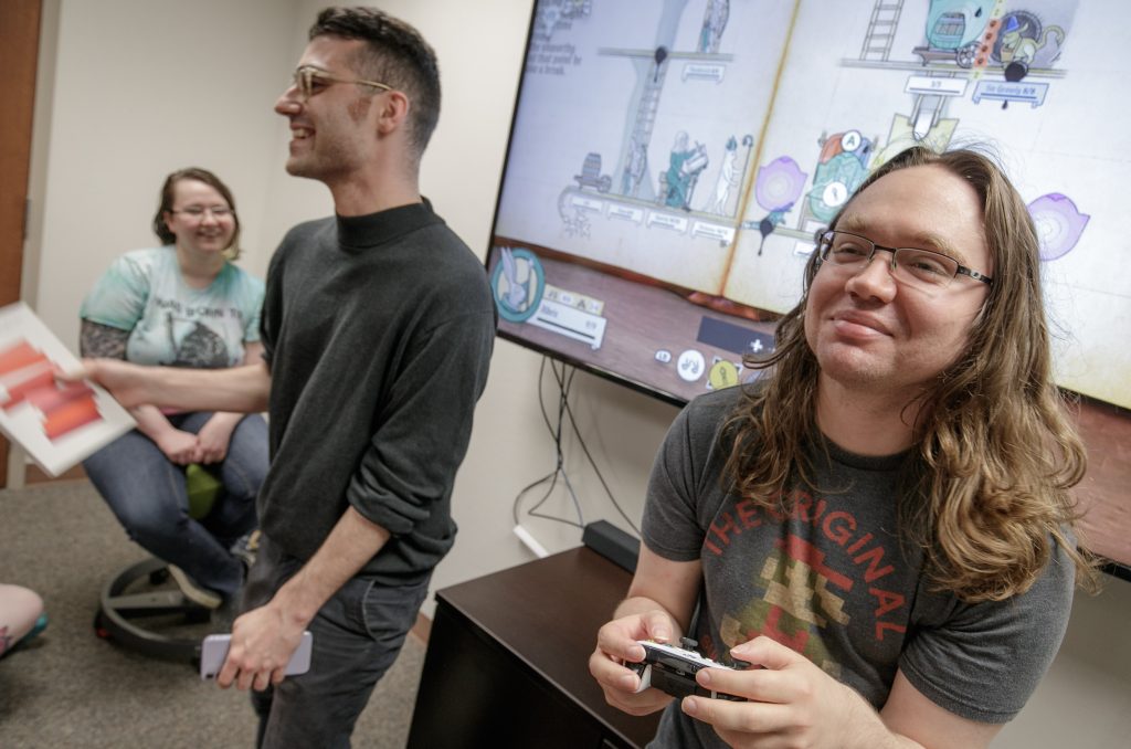 UA Little Rock students and faculty play video games during a meeting of the Inclusive Gaming Club. Photo by Ben Krain.