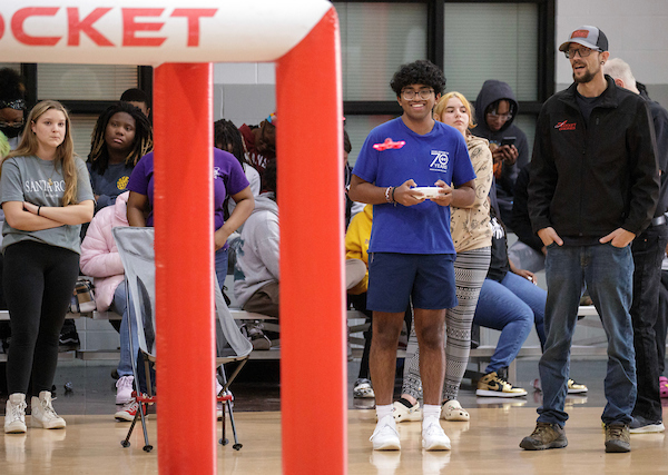 Middle and high school students participate in a UA Little Rock STEM Career and Outreach Services event teaching them how to fly a drone. Photo by Benjamin Krain.