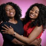 Sisters Vanessa Okeke, left, and Ivory Okeke have both graduated from UA Little Rock this spring. Photo by Benjamin Krain.