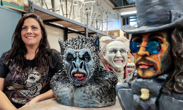 Nicole Stewart with samples of her ceramic work of various vampire phases from the Bram Stokers Dracula movie. Photo by Ben Krain.