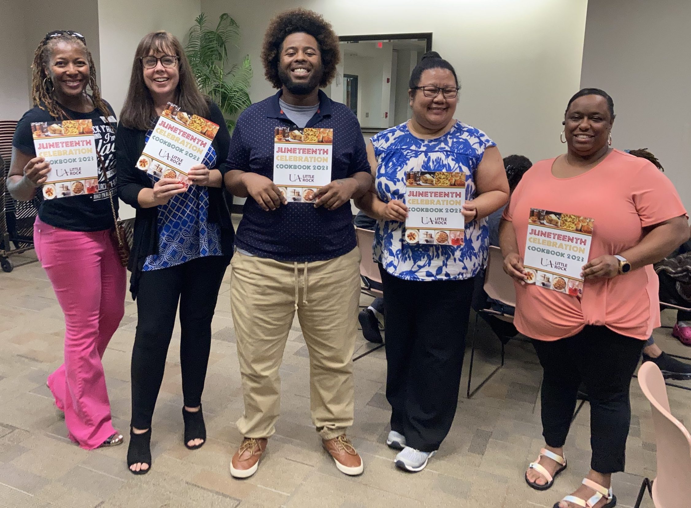 These UA Little Rock employees and community members won copies of the cookbook during the university's Juneteenth Celebration.