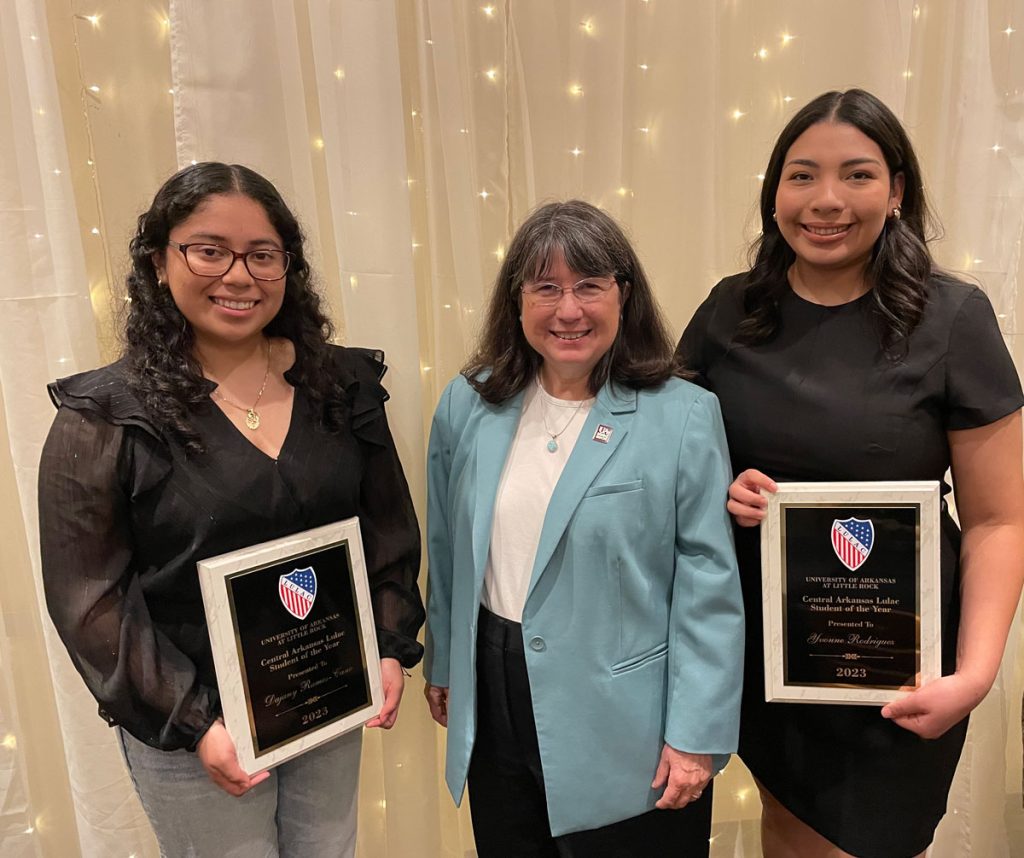 Chancellor Christina Drale, middle, congratulates Dajany Ramos-Cano and Yvonne Rodriguez, who were honored as the LULAC Students of the Year.